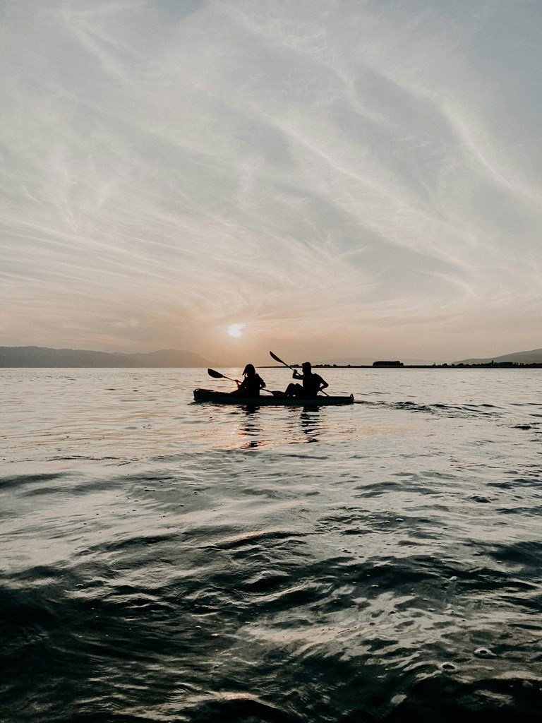 A couple kayaking in the sea