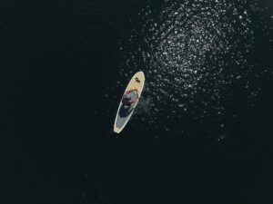 A man on paddleboard in the sea